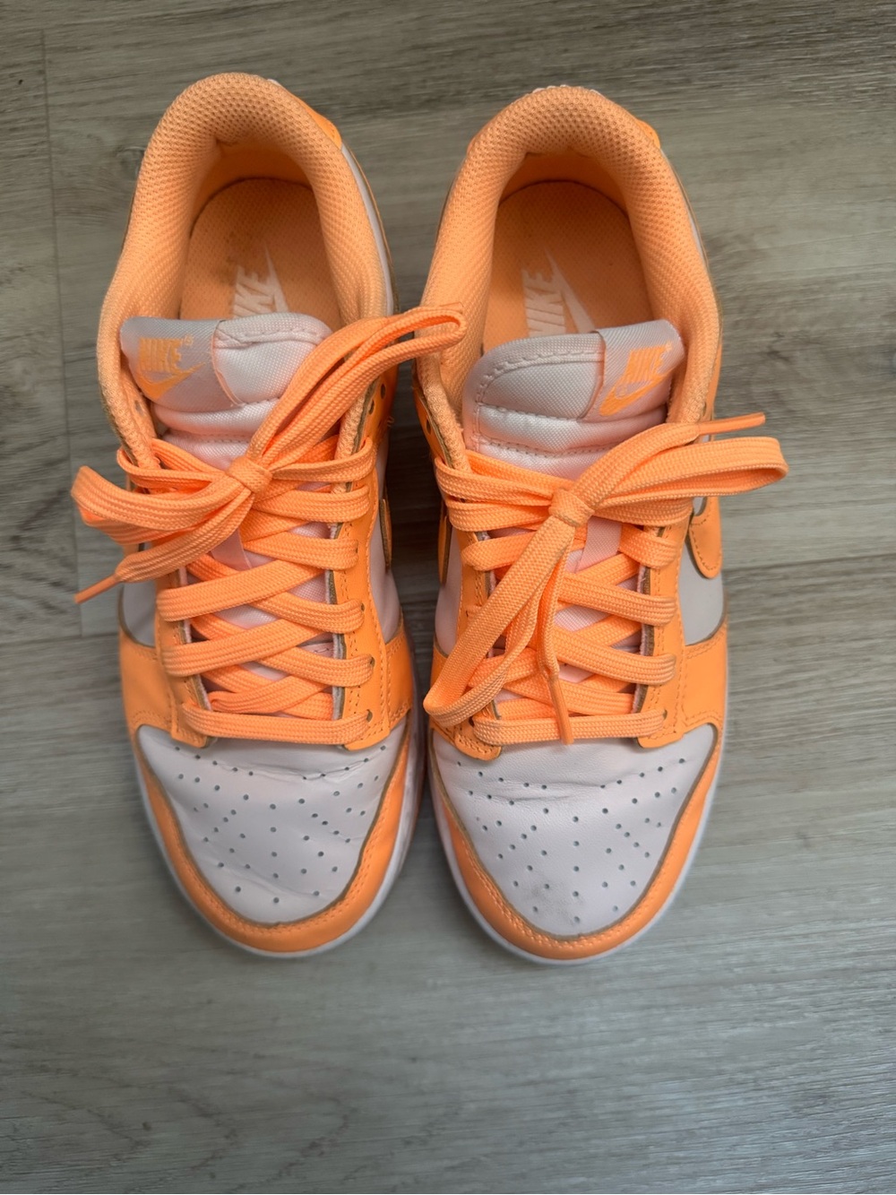 Nike Women’s Low-Top Sneakers in Peach and White